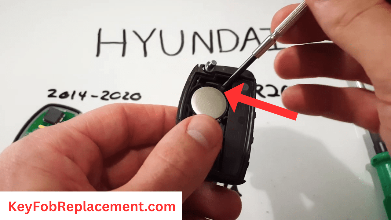 Hyundai Elantra Use screwdriver to pry out dead battery from fob