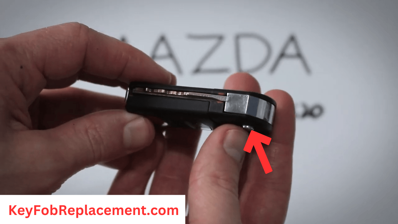 Mazda 2 Flip Key Press silver button to release internal key