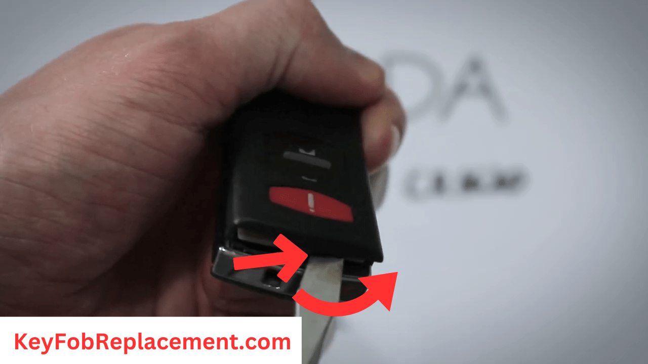 Mazda 2 Flip Key Twist tool at keyring to separate