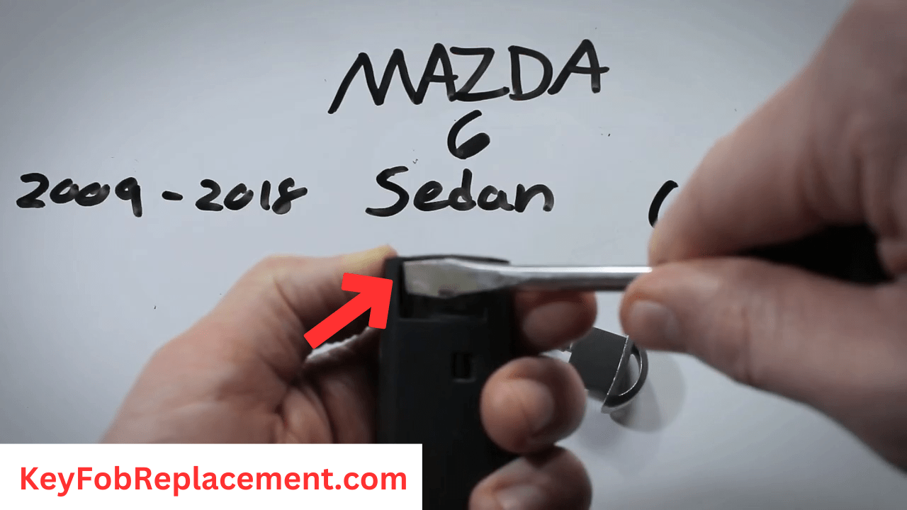 Mazda 6 Sedan Use screwdriver to loosen smart key halves
