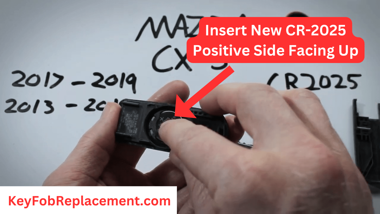 Mazda CX-5 Key Put new CR2025 battery, reassemble key