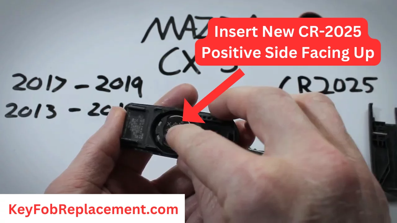 Mazda CX-5 Key Put new CR2025 battery, reassemble key