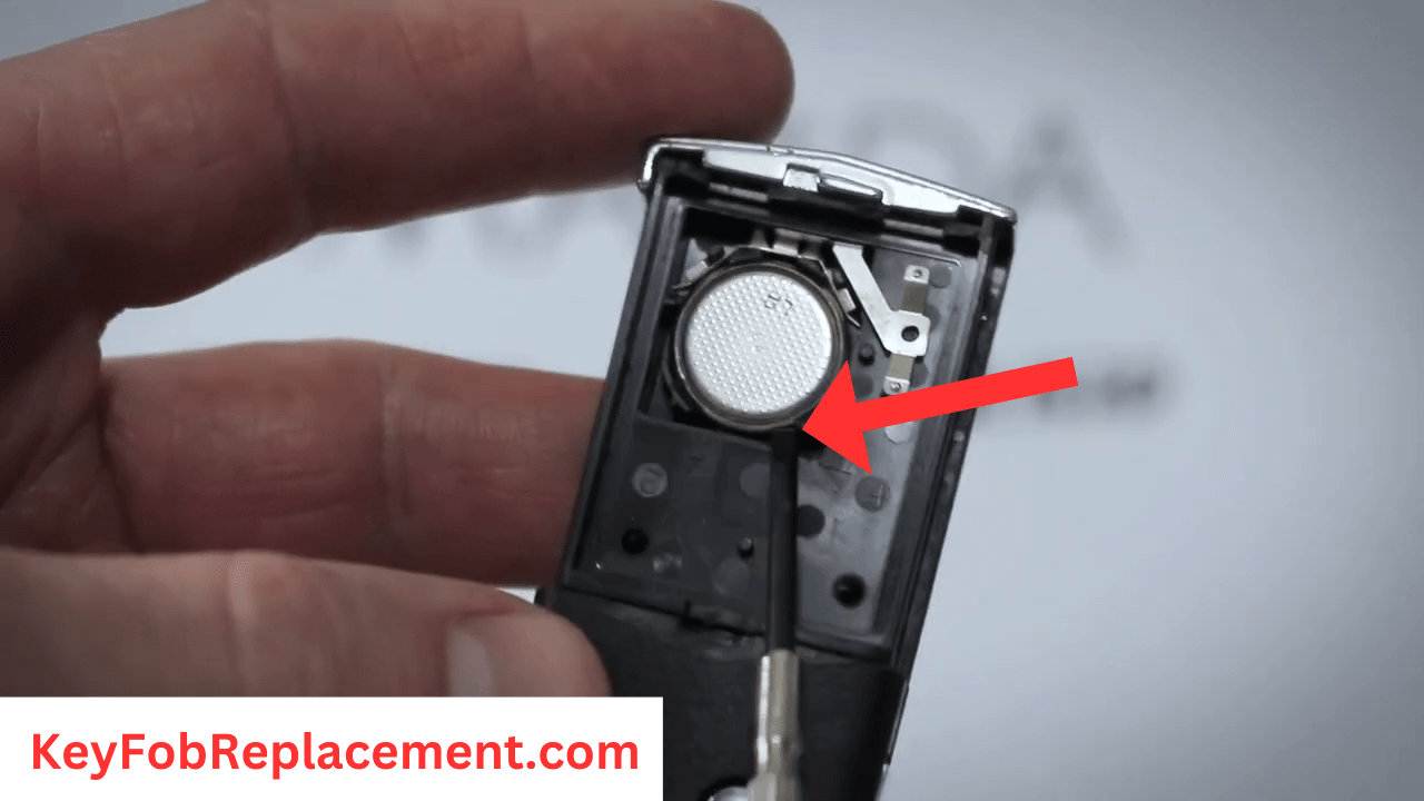 Mazda CX-7 Flip Key Remove battery with tool