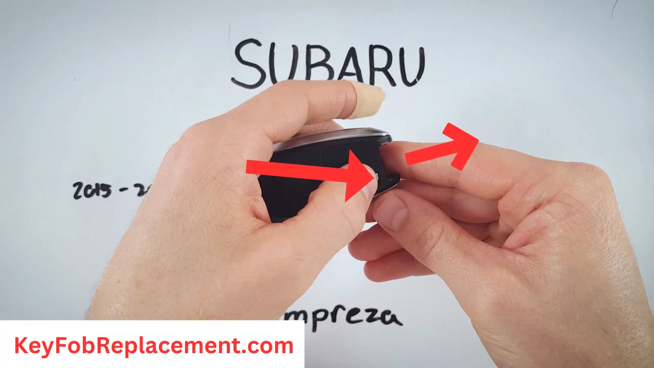 Subaru Impreza Silver Sides Hold button, remove internal key